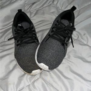 Black and white puma shoes